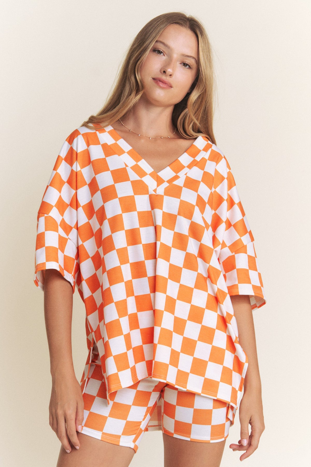 orange and white checkerboard top and biker shorts-front