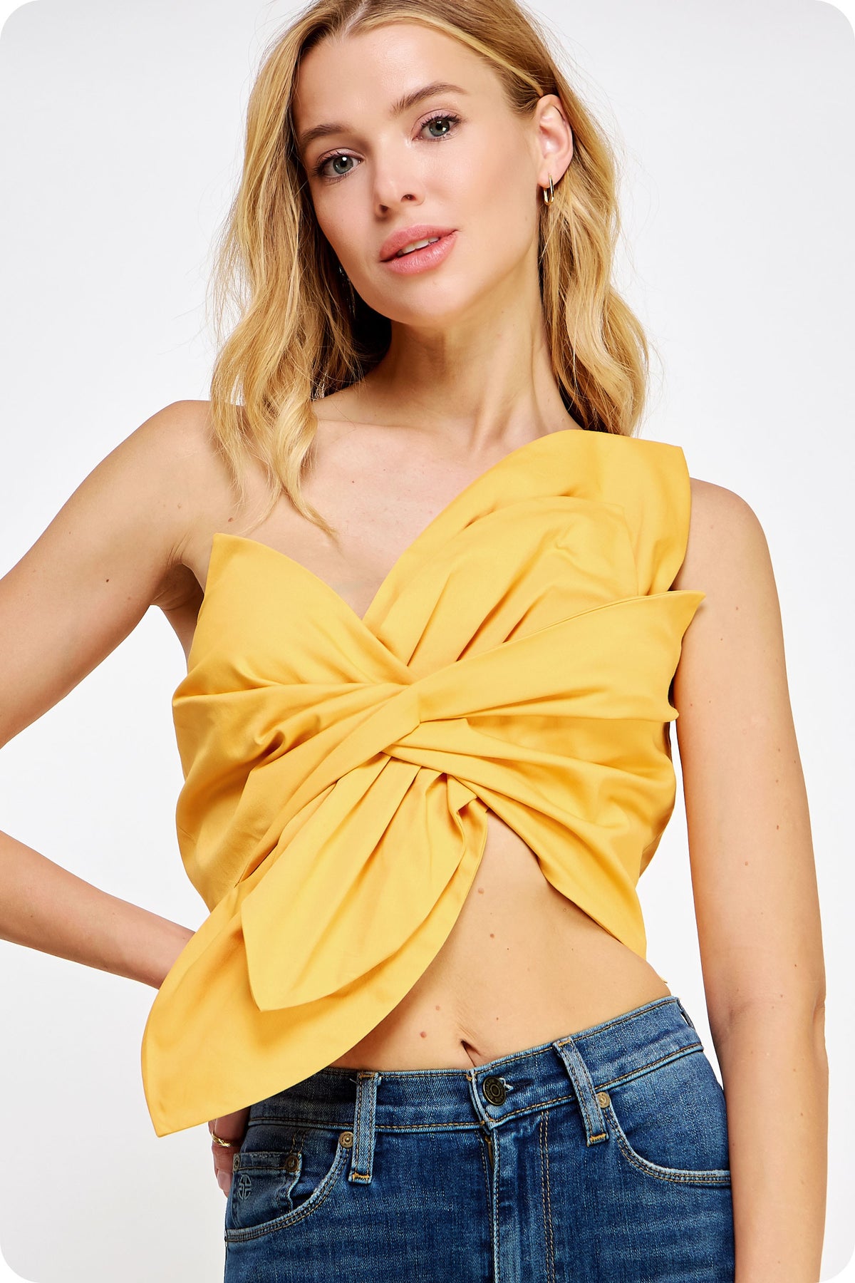 one shoulder knotted flower bow crop top in tangerine-front