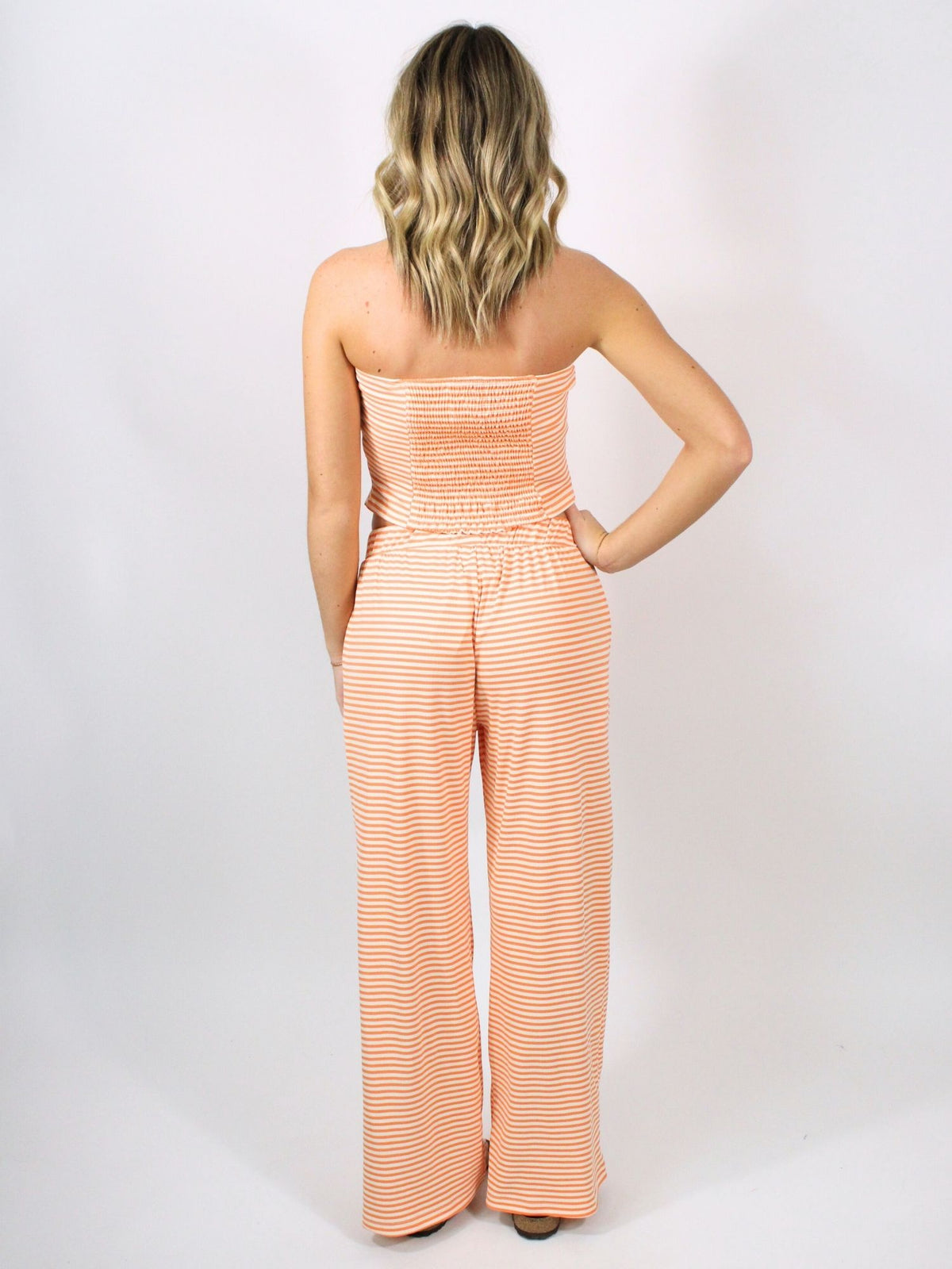orange and white stripe tube top and wide leg pants set 