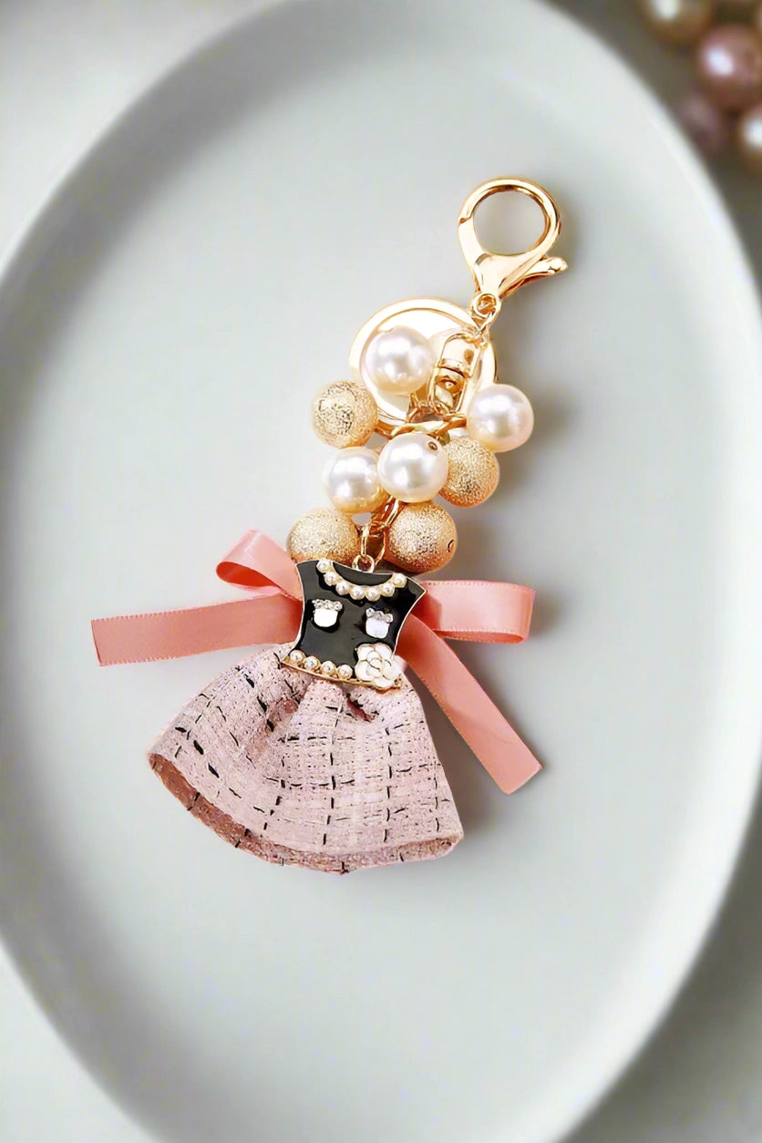 bag charm pink dress with bow faux pearls gold beads keychain