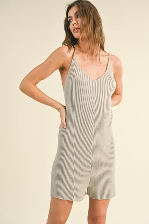 ribbed knitted romper in stone-front