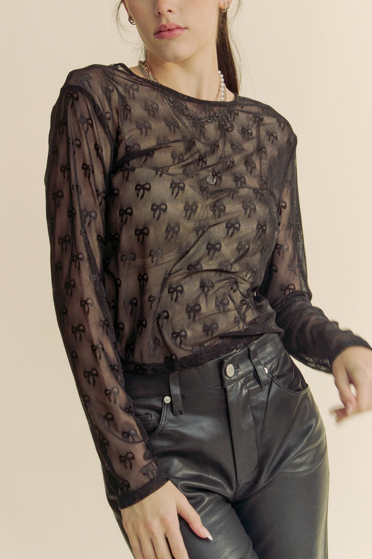 ribbon embroidered long sleeve mesh top in black-front