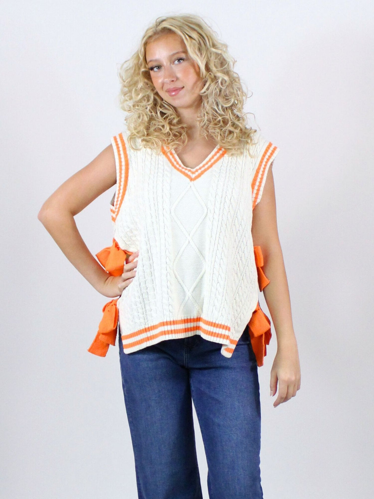 Rocky Top Bow Sweater in white and orange 