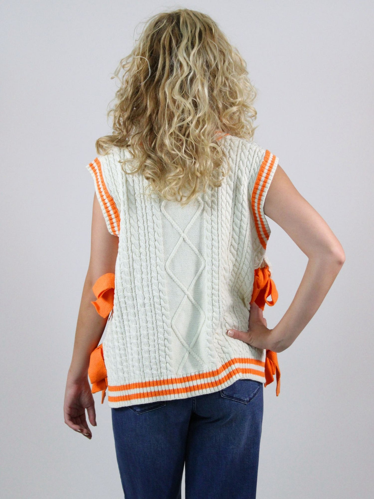 Rocky Top Bow Sweater in white and orange 