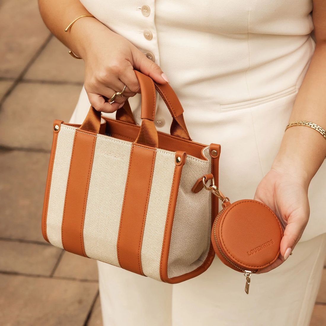 Shop Summer Handbags, Wallets & Accessories at Bliss Knoxville. LOUENHIDE Mini Manhattan Canvas Tote Bag.