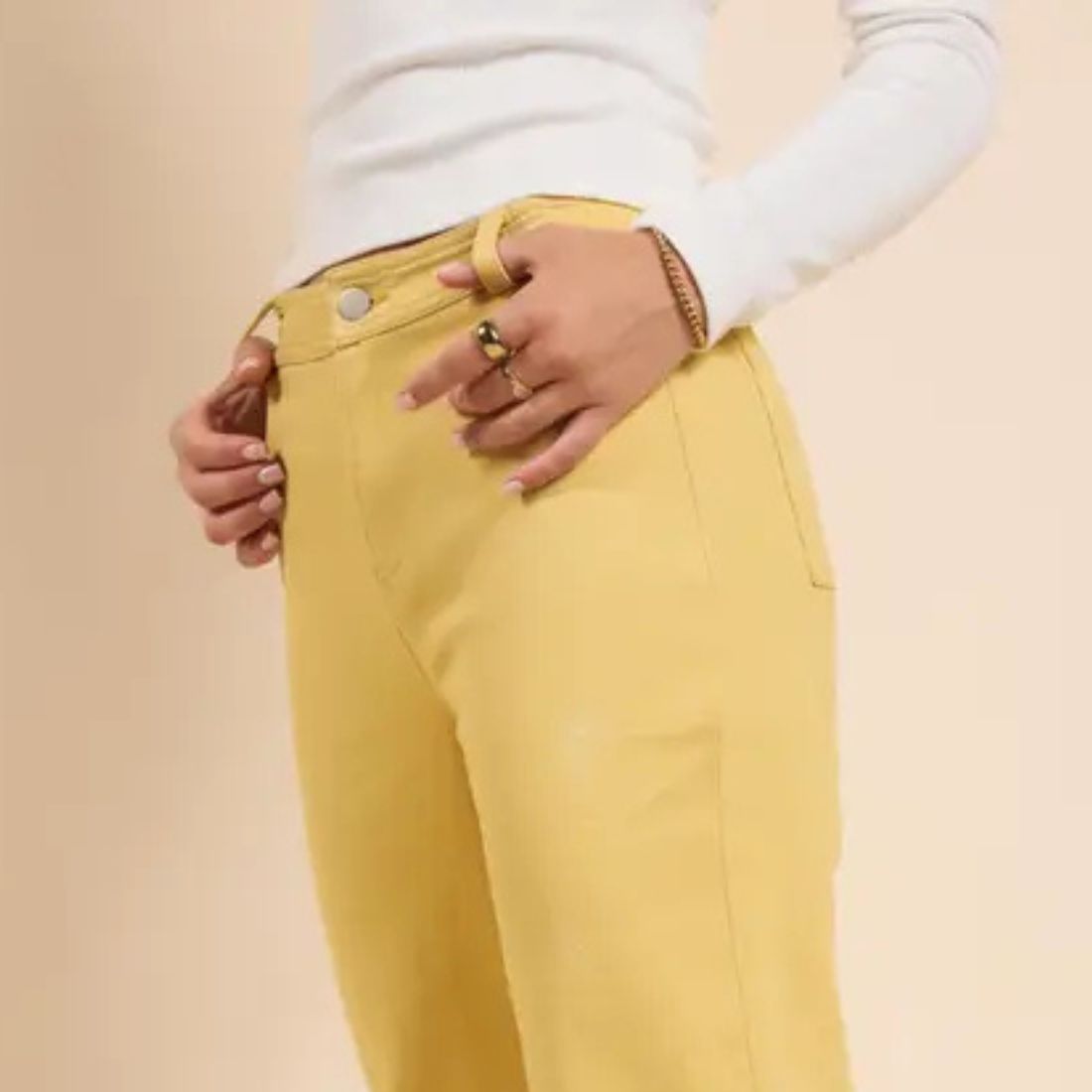 shop spring clothing bottoms shorts skirts pants at bliss knoxville close up of model in yellow jeans