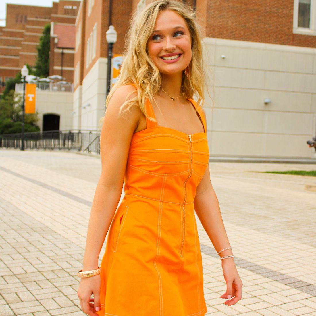 Shop Tennessee Volunteers Gameday Dresses & Rompers at Bliss Knoxville. TN Vols Gameday Fashion Clothing for Women. Orange Denim Zip-Front Mini Dress.