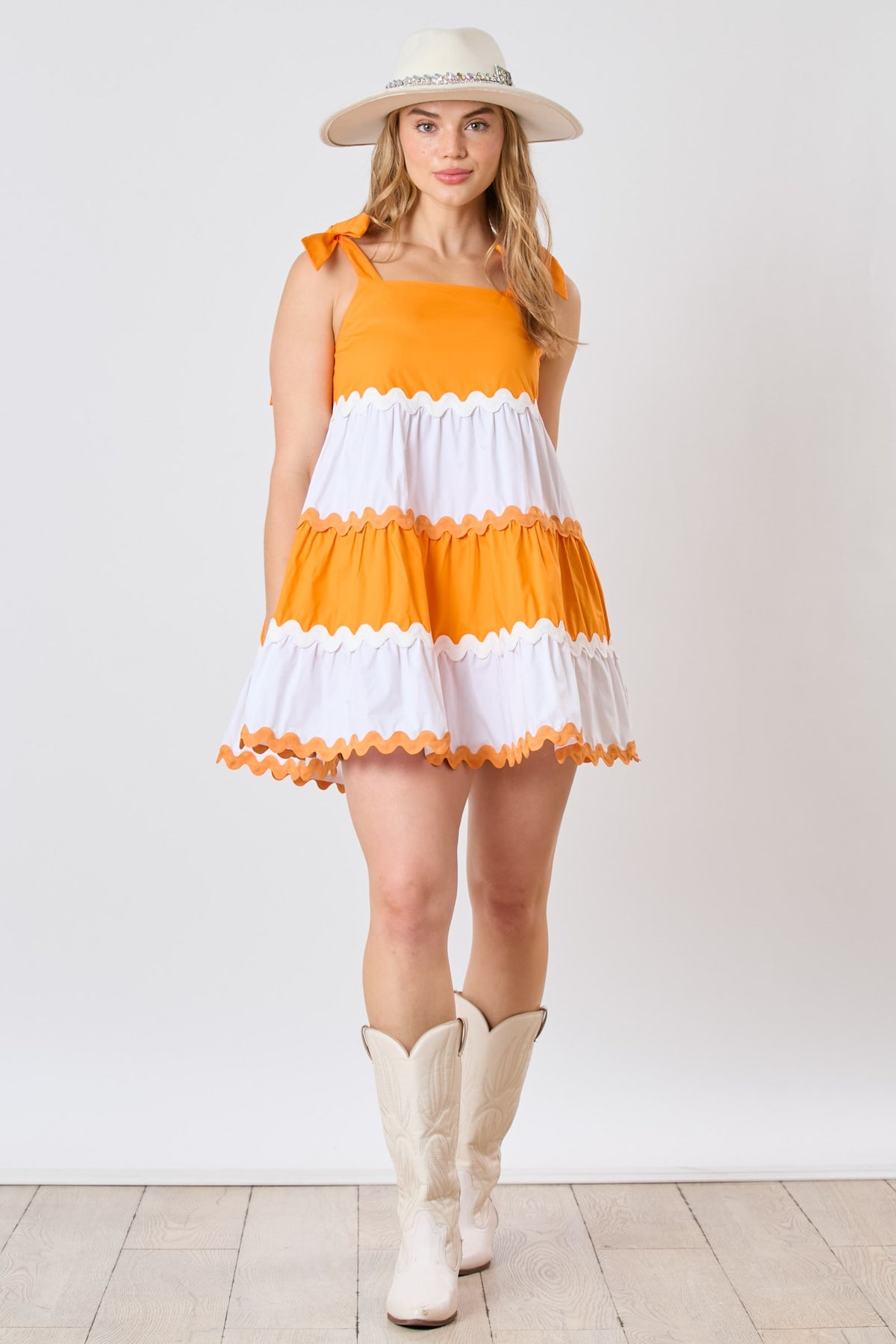 tennessee touchdown vibes shoulder tie mini dress with ric rack trim in orange and white-front