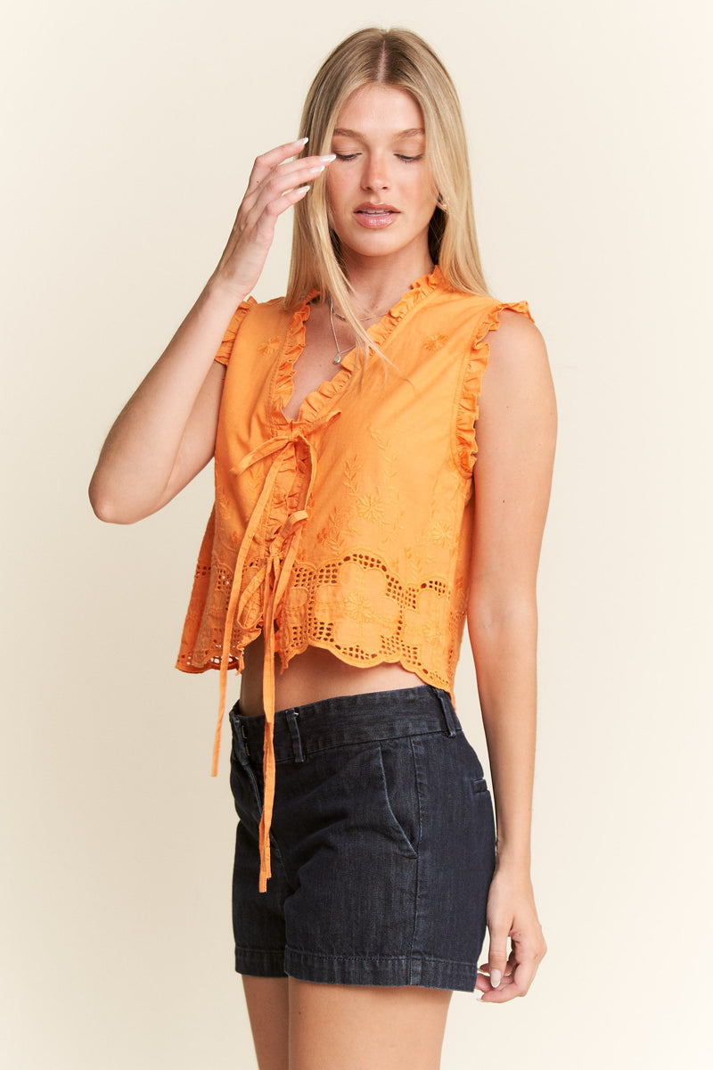 sleeveless ruffle tie top in orange