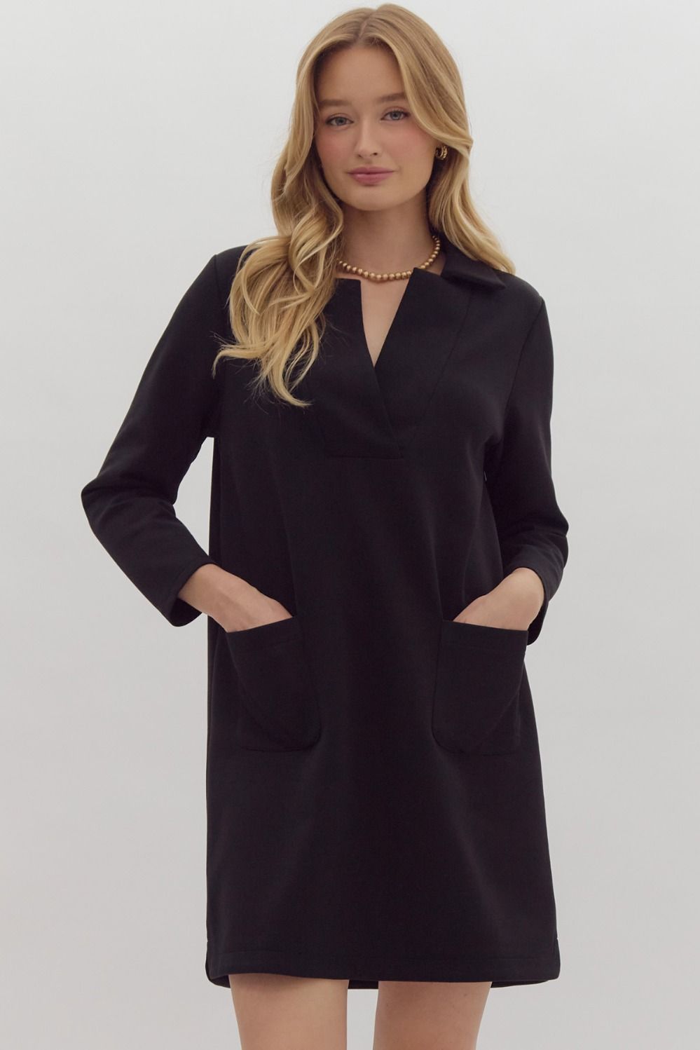 solid v neck 3/4 sleeve mini dress in black-front