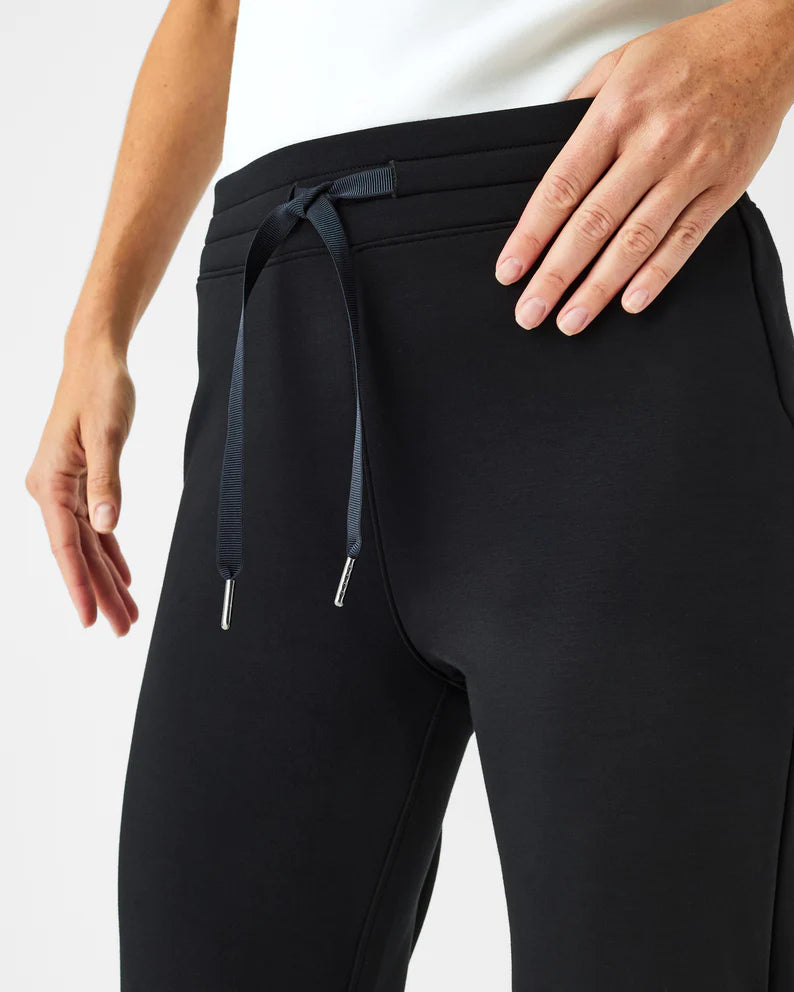 Spanx AirEssentials Tapered Pant in very black-front detail view