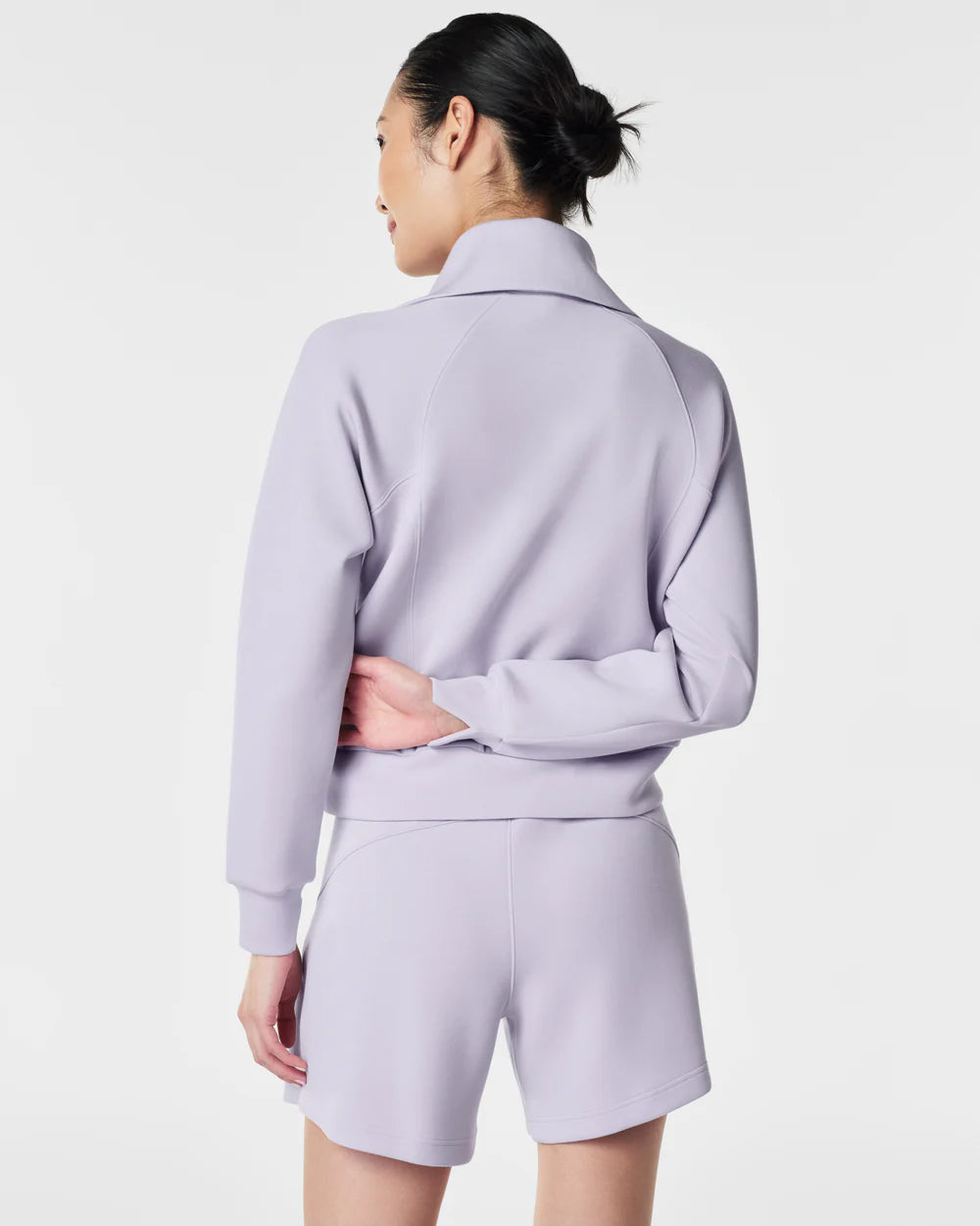 spanx airessentials half zip in violet air- back view