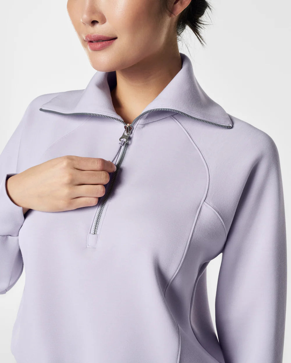 spanx airessentials half zip in violet air- front view