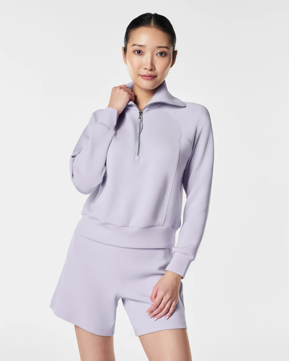 spanx airessentials half zip in violet air- front view