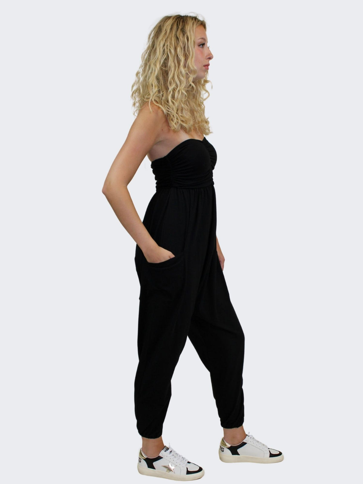 black strapless ruched jogger jumpsuit with pockets