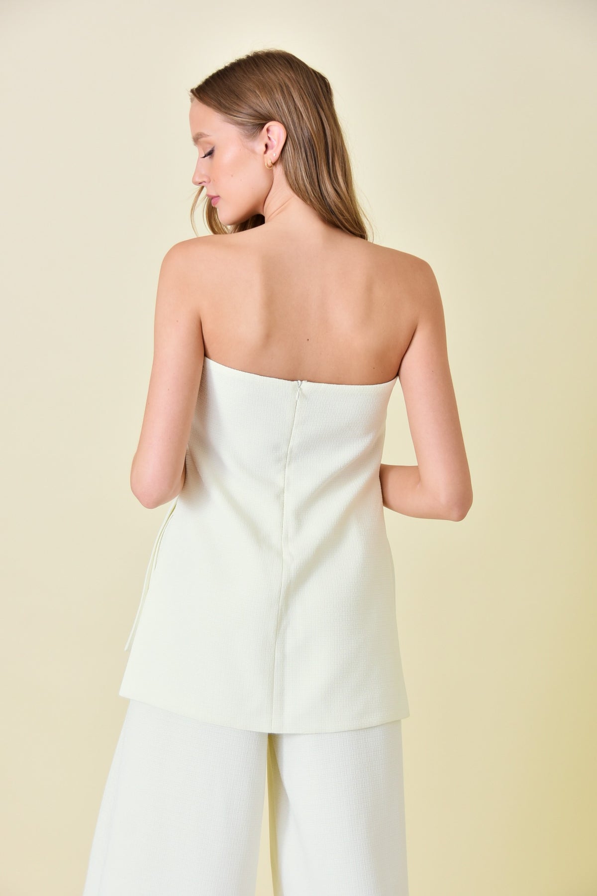 strapless woven side slit top in ivory-back