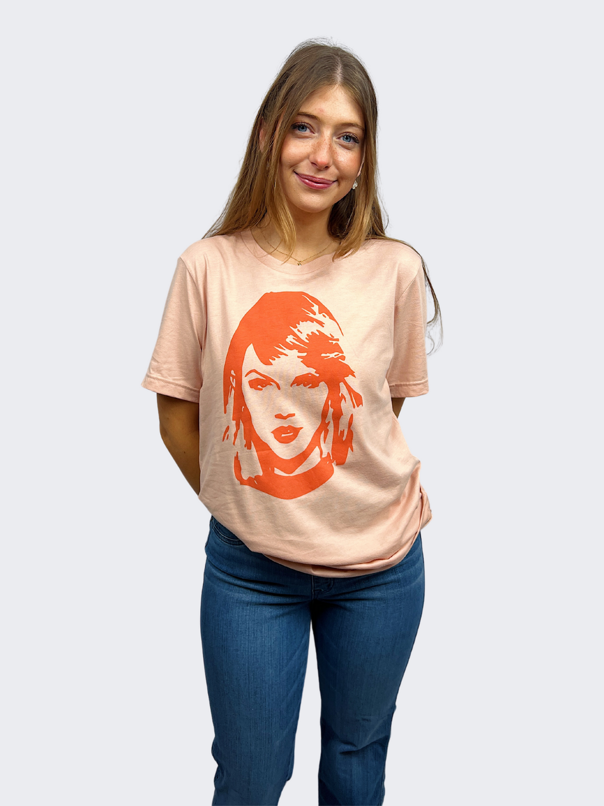 taylor swift face graphic tee in peach orange-front view