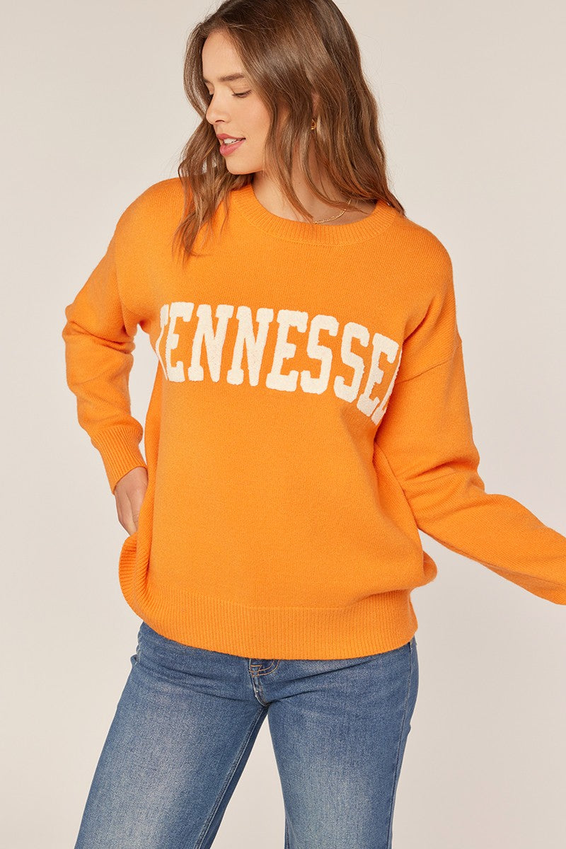 orange sweater with tennessee across the front 