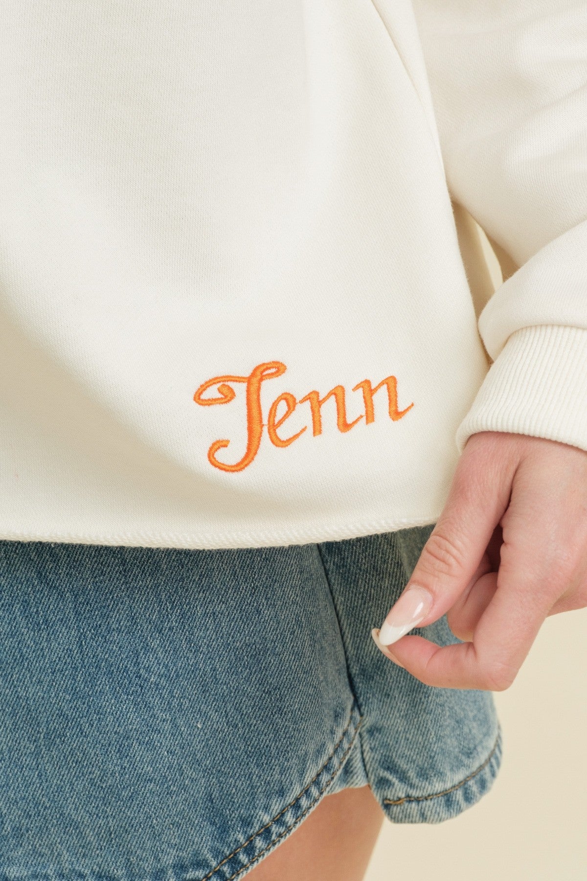 TN Gameday Sweatshirt in cream & orange-bottom detail