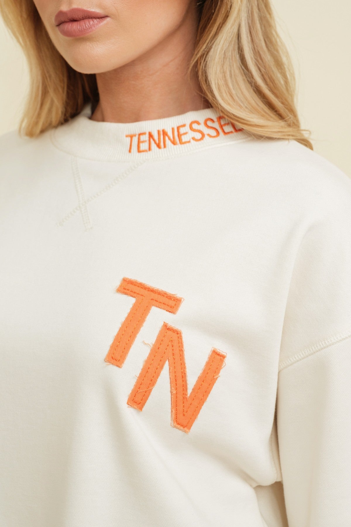 TN Gameday Sweatshirt in cream & orange-front detail