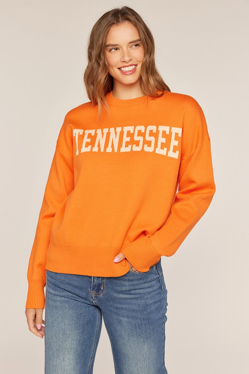 orange sweater with tennessee across the front 