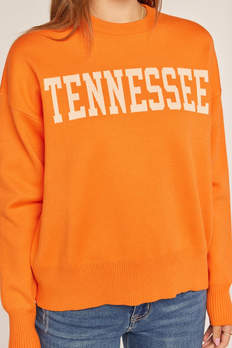 orange sweater with tennessee across the front 
