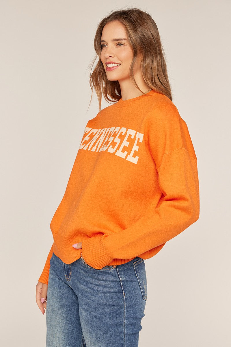 orange sweater with tennessee across the front 