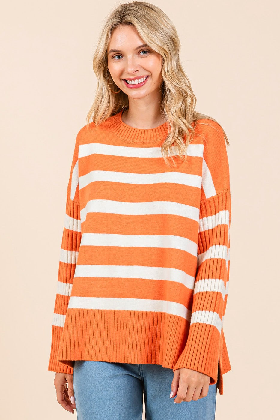 tennessee orange and white striped ribbed long sleeve oversized knit sweater in orange-front