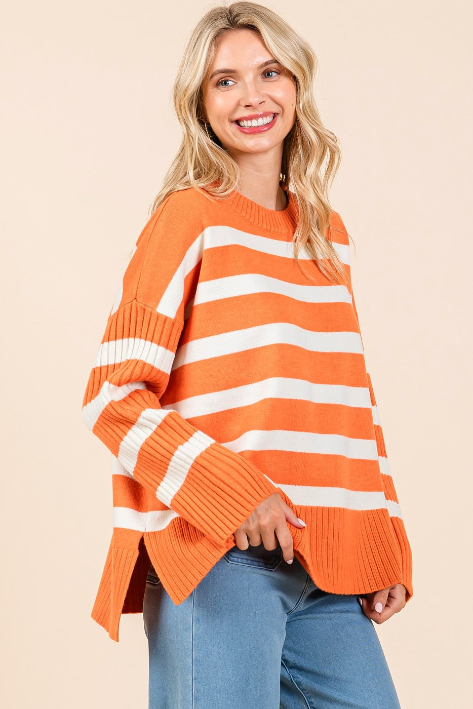 tennessee orange and white striped ribbed long sleeve oversized knit sweater in orange-front