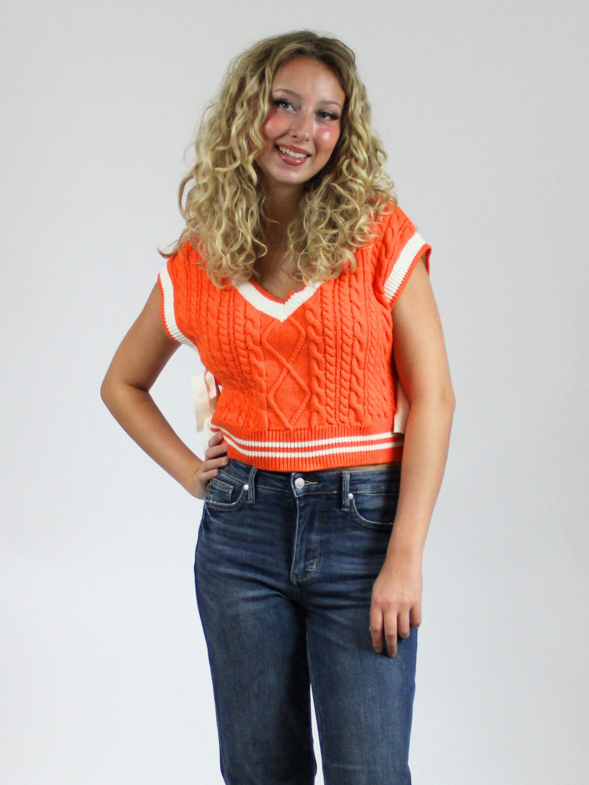 tennessee stripes and bows sweater vest in orange-front