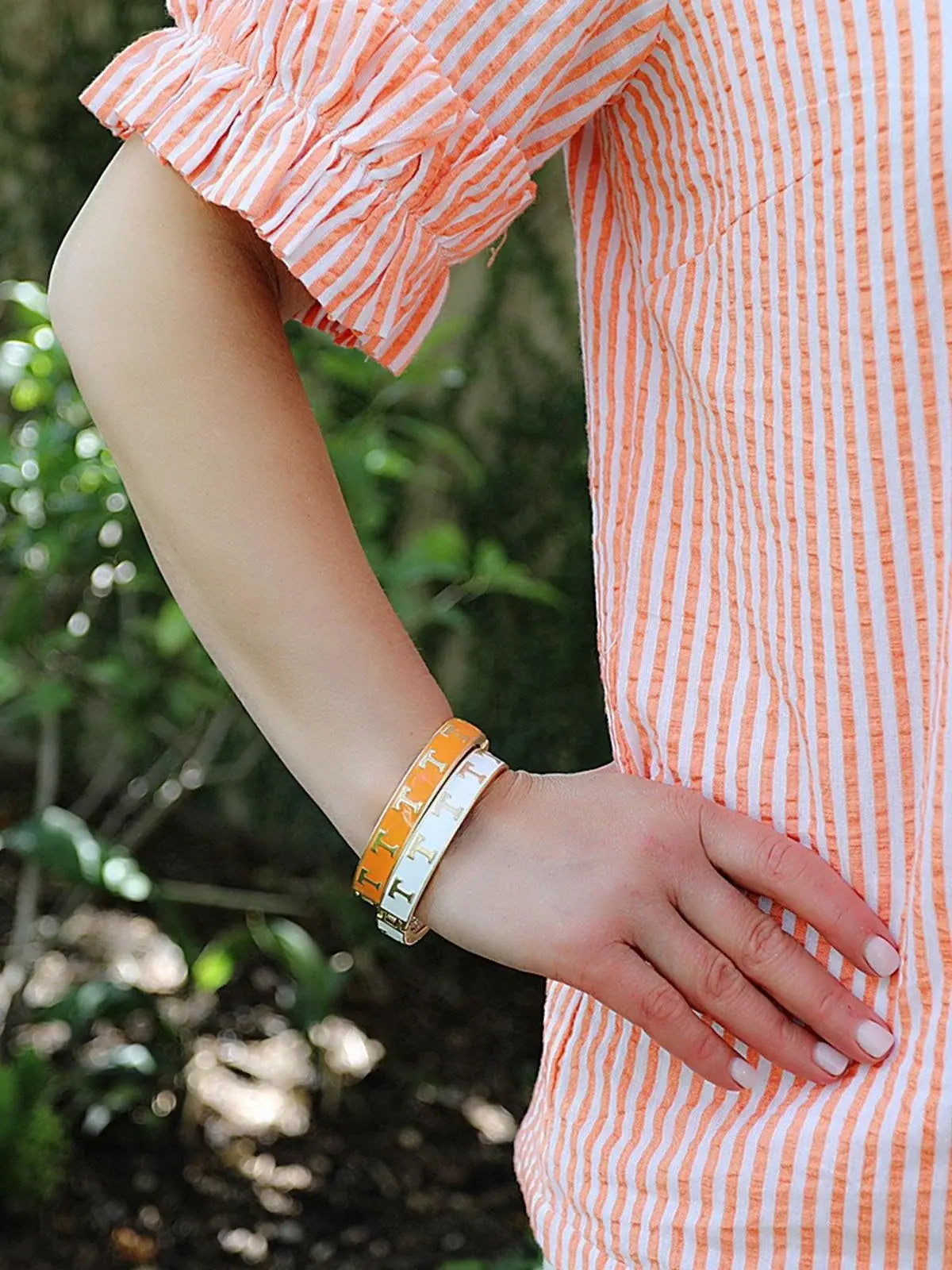 tennessee volunteers enamel logo hinge bangle bracelet in orange and white for game day style