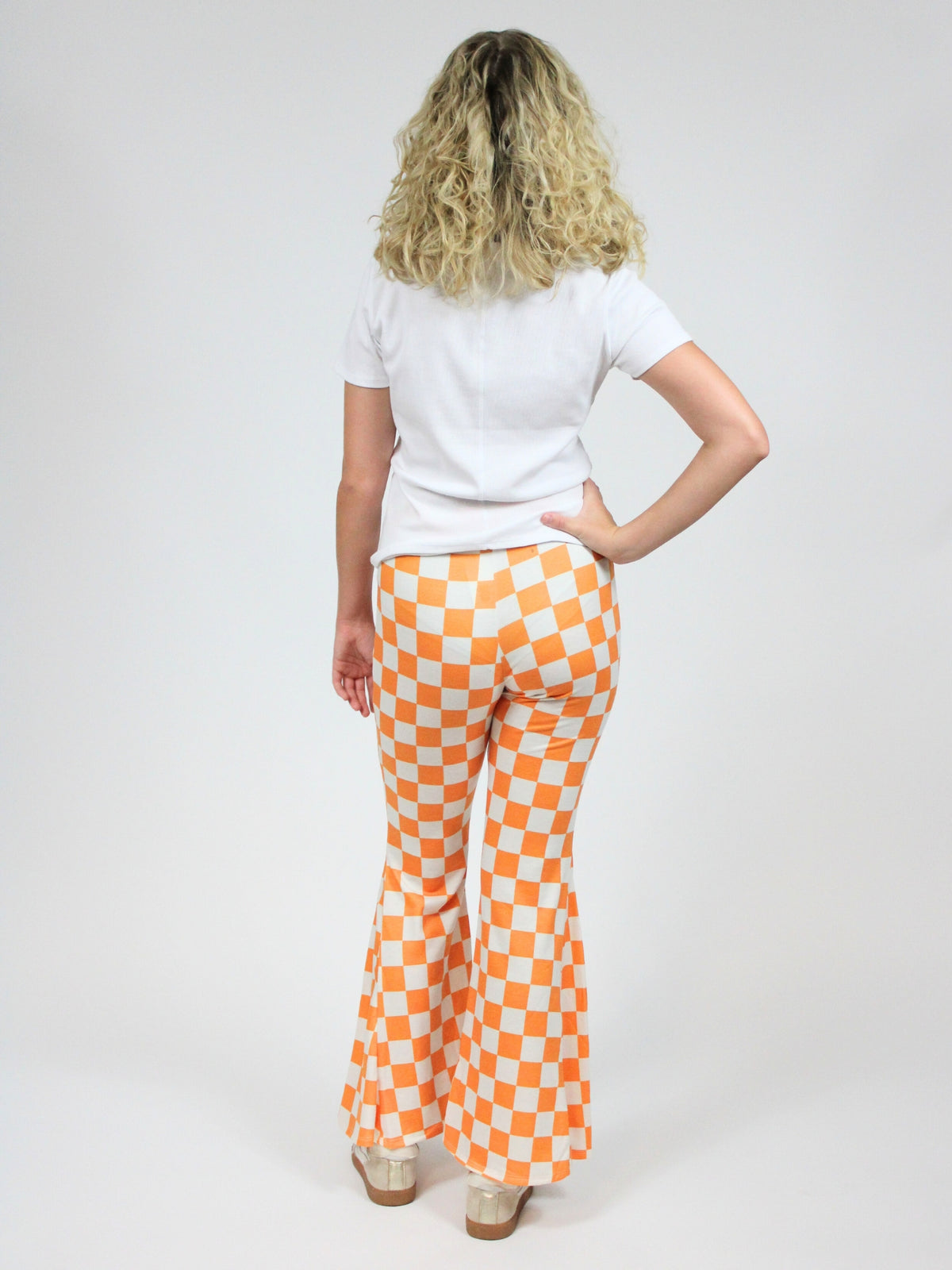 tn gameday orange and white checkerboard flare pants back view