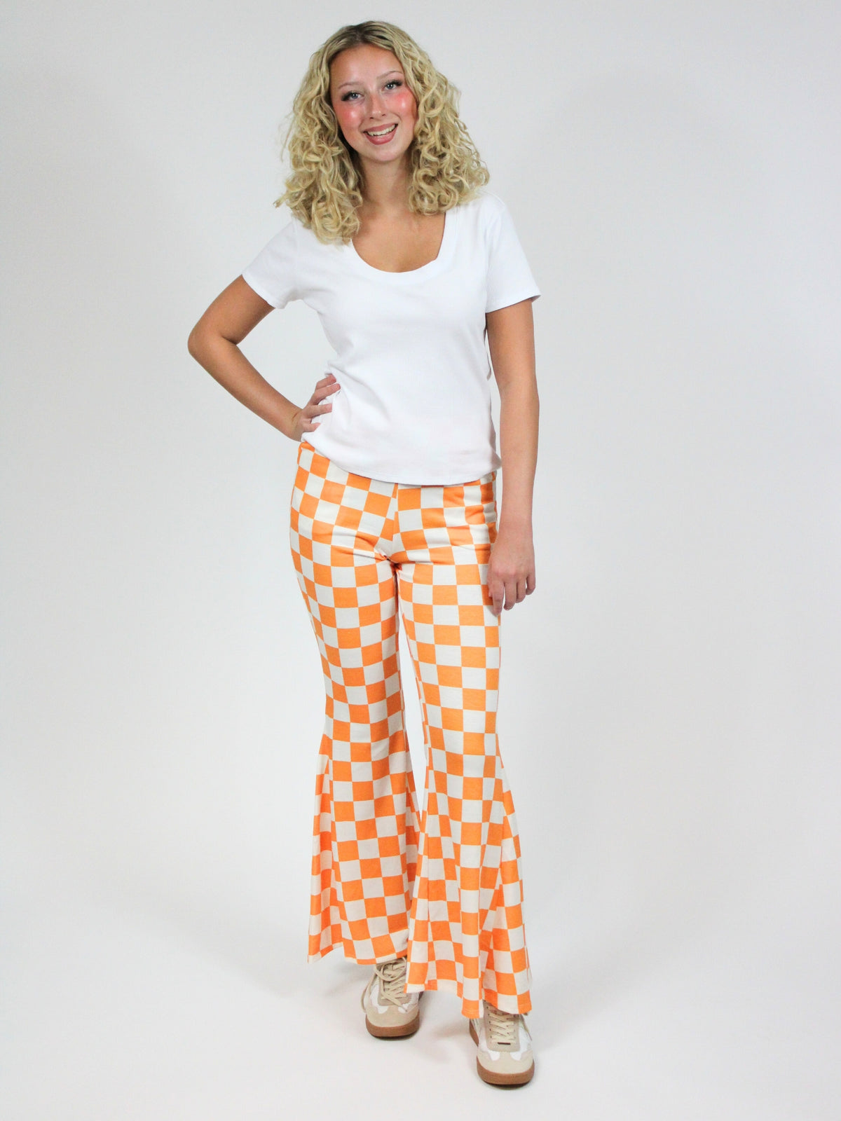 tn gameday orange and white checkerboard flare pants full model view