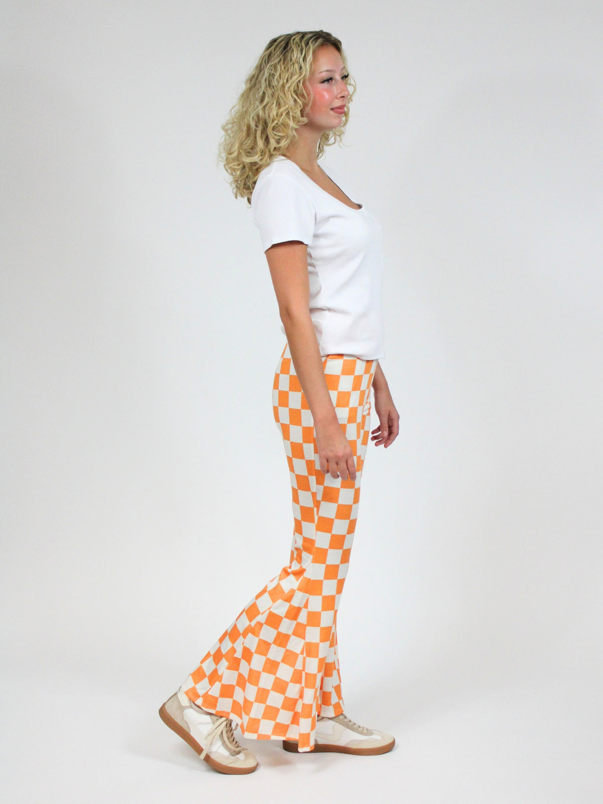 tn gameday orange and white checkerboard flare pants side view