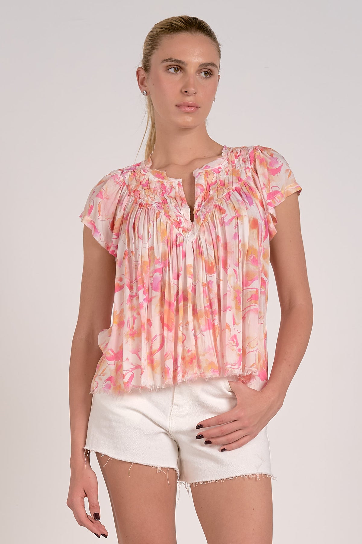 elan floral fray hem top  in pink allure 