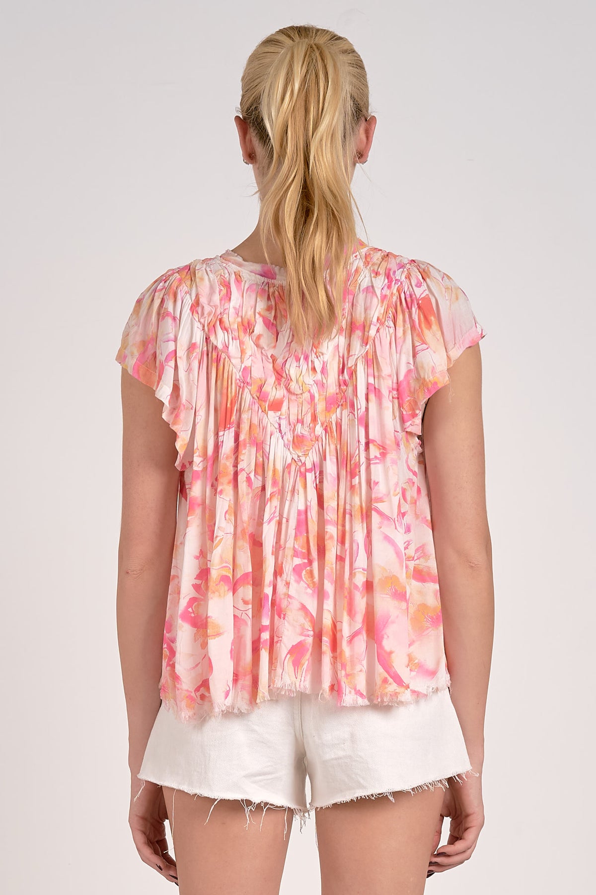 elan floral fray hem top  in pink allure 