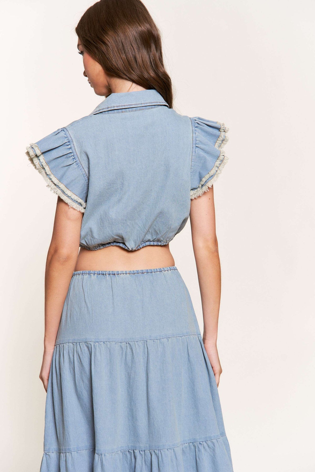 washed denim ruffle sleeve cropped button down top in denim blue-back