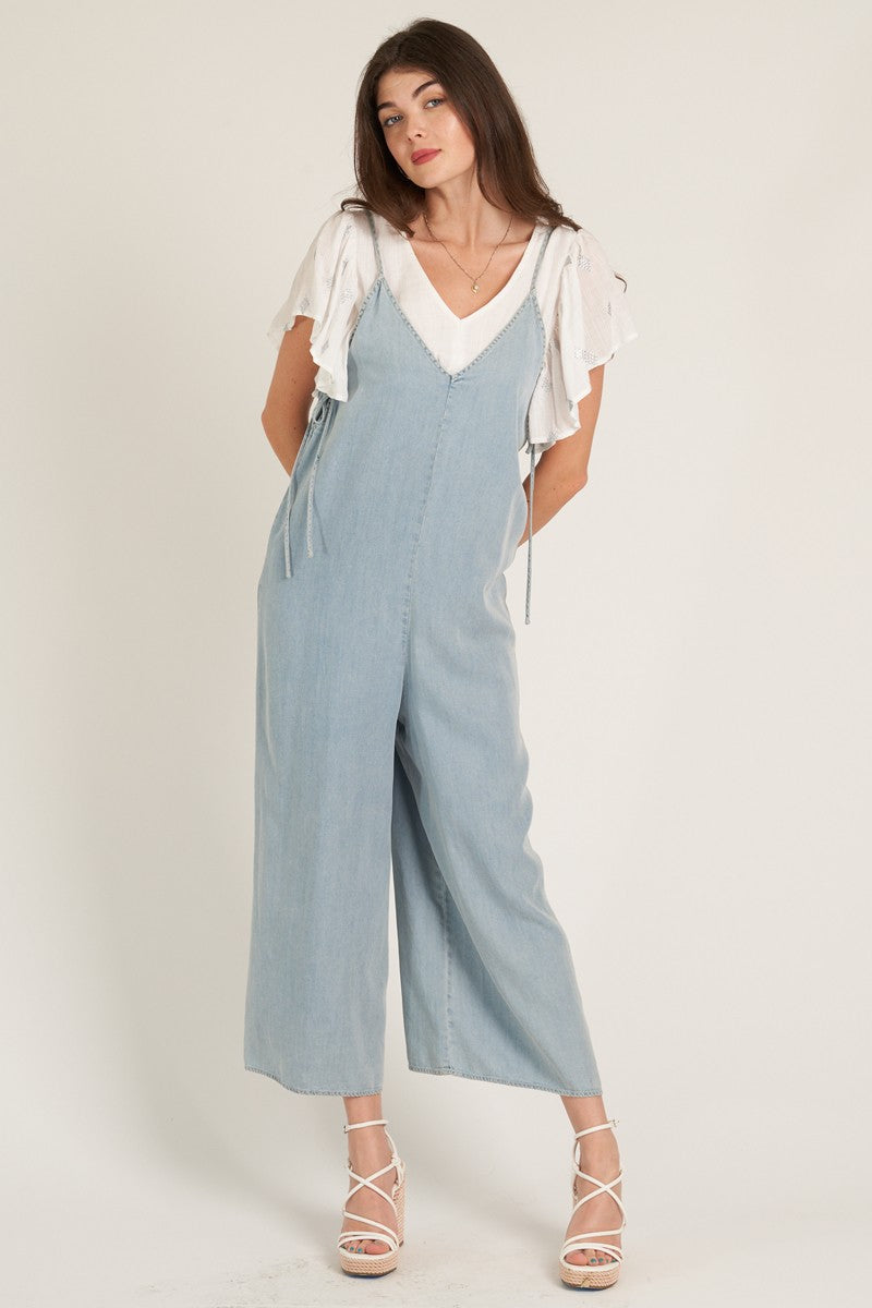 wide leg denim jumpsuit in light wash denim-front view