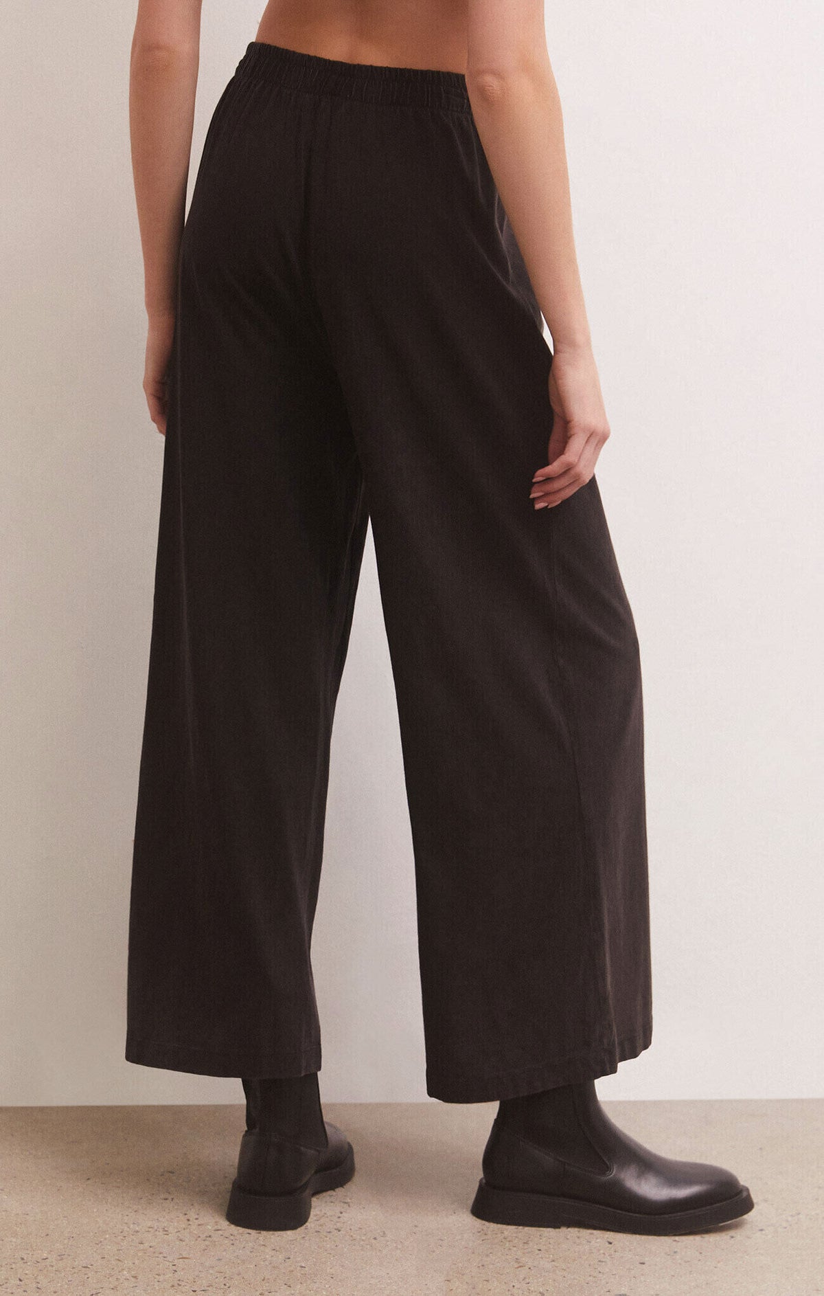 z supply scout jersey flare pant in black-back